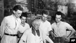 Architect Frank Lloyd Wright, center, is surrounded by four apprentices who work and study under his direction at Taliesin, his estate at Spring Green, Wis., Aug. 17, 1938. The students are, from left, Eugene Masselink, Edgar Tafel, Jack Howe, and Bennie