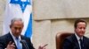 نخست وزیر بریتانیا به سخنرانی میزبان و همتای اسرائیلیش در «کنست» گوش می کند.