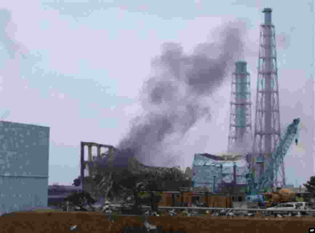 Smoke rising from Unit 3 of the tsunami-stricken Fukushima Daiichi nuclear power plant, March 21, 2011.