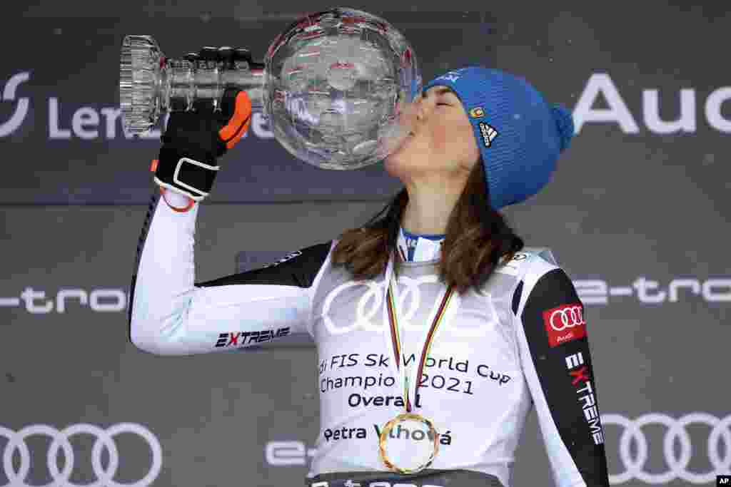 Slovakia&#39;s Petra Vlhova kisses the trophy of the alpine ski, women&#39;s World Cup overall title, in Lenzerheide, Switzerland.