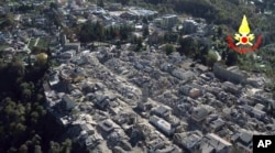 An aerial view of the destroyed hilltop town of Amatrice after an earthquake with a preliminary magnitude of 6.6 struck central Italy, Oct. 30, 2016.