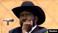 South Sudan President Salva Kiir attends the signing of a peace agreement with the South Sudan rebels aimed to end a war in which tens of thousands of people have been killed, in Khartoum, Sudan June 27, 2018. 
