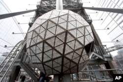FILE - The Waterford crystal ball is shown atop One Times Square on Dec. 27, 2015, in New York.