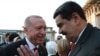 FILE - Turkey's President Recep Tayyip Erdogan (L) talks to Venezuela's President Nicolas Maduro (R) prior to a dinner following a ceremony at the Presidential Palace in Ankara, Turkey, July 9, 2018.