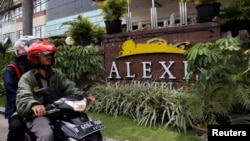A motorist drives past the Alexis Hotel in Jakarta, Indonesia, Oct. 19, 2017. 