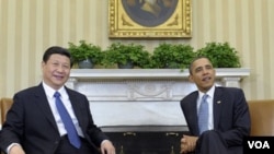 Vis prezidan chinwa a, Xi Jinping fè premye vizit li nan Lamezon Blanch kote li fè chita-koze ak Prezidan Barack Obama (AP Photo/Susan Walsh)