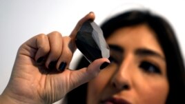 The Enigma is 555.55 carats, January 17, 2022, January 17, 2022. (AP Photo/Kamran Jebreili)