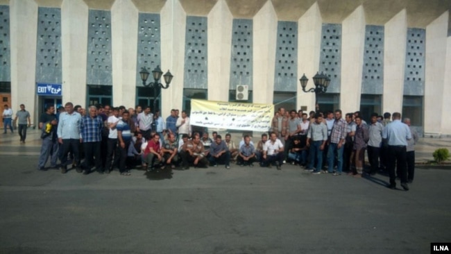 In this undated image published by Iranian news agency ILNA on July 30, 2018, railway workers stage a protest in the northwestern Iranian city of Tabriz to demand resolution of labor complaints including unpaid salaries.