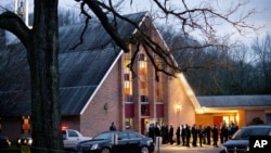 Mourners gather for the wake for Sandy Hook Elementary School shooting victim Charlotte Helen Bacon, 6, in Newtown, Connecticut 
