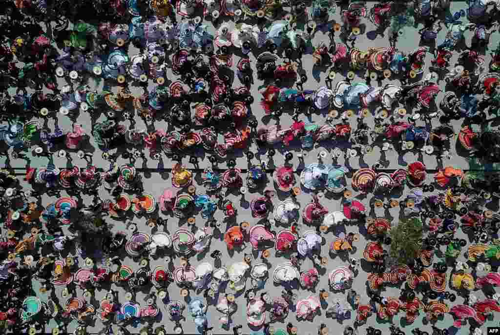 Aerial view of couples dancing to Mariachi traditional music to break the Guinness World Record of largest Mexican folk dance in Guadalajara, Jalisco state, Mexico, Aug. 24, 2019.