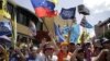 Capriles y Chávez tras los votos en las calles