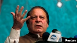 Nawaz Sharif speaks to party members during a function in Lahore in this May 20, 2013 file photo. 