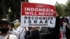 Ribuan warga Muslim melakukan unjuk rasa menentang serangan militer Israel atas Jalur Gaza, dalam aksi di Jakarta 21 Mei 2021. (Foto: AP /Dita Alangkara)