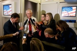 Secretary of State Rex Tillerson speaks with reporters on a flight with President Donald Trump to Israel, May 22, 2017, aboard Air Force One.