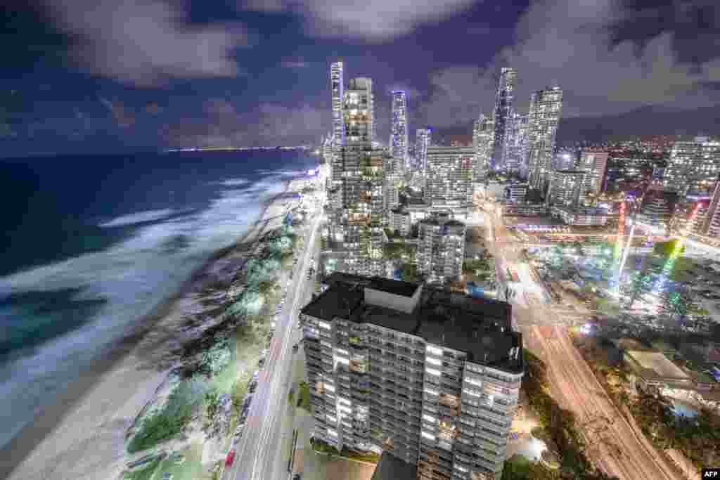 This picture taken as a long exposure shows rain clouds moving over the Gold Coast, the host city of 2018 Gold Coast Commonwealth Games.