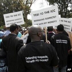 Kenyan protesters holds placards as they protest to support the International Criminal Court (ICC) in Nairobi at Freedom Corner in Nairobi, Kenya (File Photo -January 18, 2011)