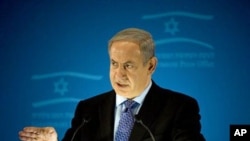 Israeli Prime Minister Benjamin Netanyahu delivers a statement to members of the foreign press in Jerusalem insisting that Iran will not stop its nuclear program unless economic sanctions are backed with a 'credible military option,' 11 Jan 2011