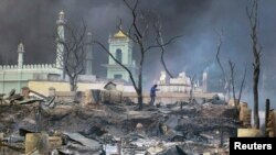 A mosque burns in Meikhtila, Burma on March 21, 2013. 