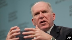 FILE - CIA Director John O. Brennan speaks at the Council on Foreign Relations in Washington, March 11, 2014.