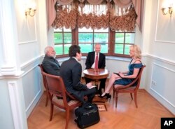 NBC journalist Megyn Kelly interviews India's Prime Minister Narendra Modi (left) and Russian President Vladimir Putin (center) in the Constantine Palace at the St. Petersburg International Economic Forum in St. Petersburg, Russia, June 1, 2017.