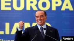 Forza Italia leader Silvio Berlusconi gestures during EPP European People's Party meeting in Fiuggi, Italy, Sept. 17, 2017.