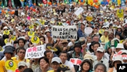 Organizers say 60,000 participated, in their largest protest since the mid-March nuclear plant accident at Fukushima, September 19, 2011.