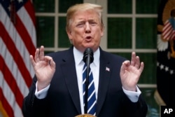 FILE - President Donald Trump delivers a statement in the Rose Garden of the White House, May 22, 2019.