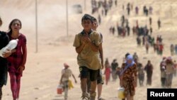 Iračke izbjeglice Yazidi bježe pred militantima Islamske države 