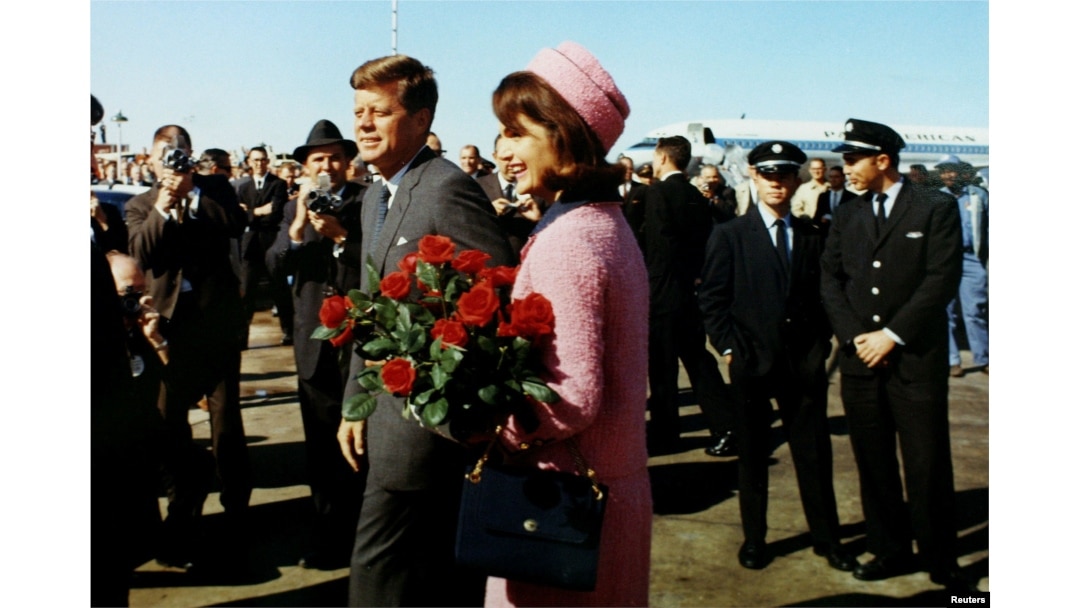 FILE - President John F. Kennedy and first lady Jacqueline Bouvier Kennedy arrive at Love Field in Dallas, Texas, Nov. 22, 1963.