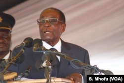 Zimbabwe’s President Robert Mugabe, addressing mourners in Harare, said some of the economic "saboteurs" were actually within his ruling Zanu PF party, September 2017.