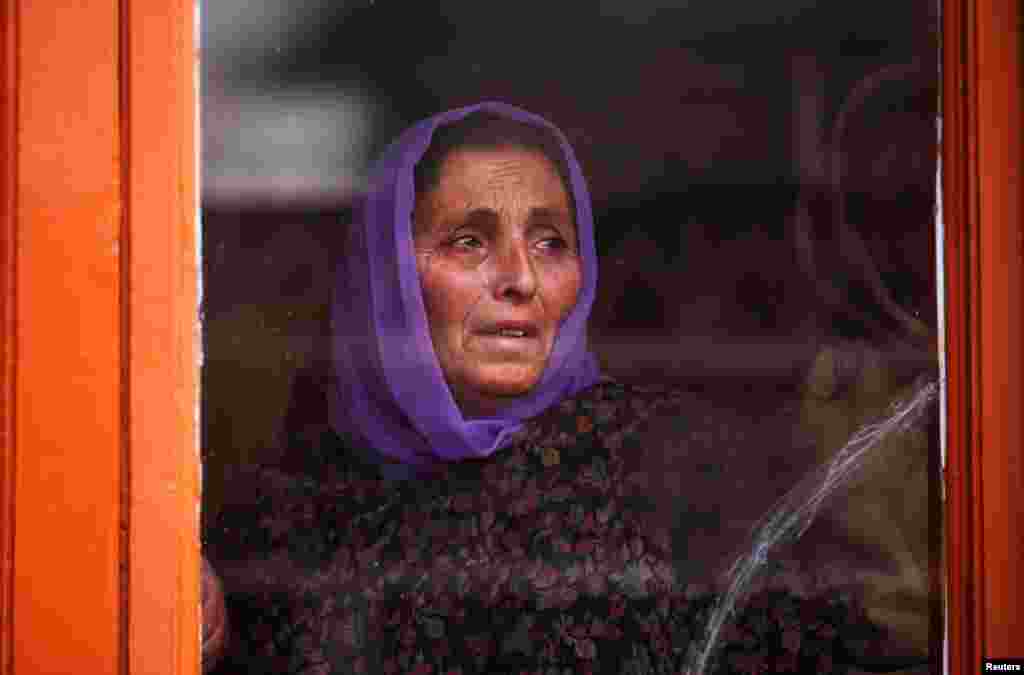 A relative mourns during the funeral of Ghulam Mohammad Khan, a civilian who according to local media, succumbed to injuries from a teargas shell fired by Indian police during a protest earlier this month, in Srinagar.