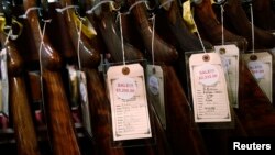 Shotguns are seen during the East Coast Fine Arms Show in Stamford, Connecticut, Jan. 5, 2013. 