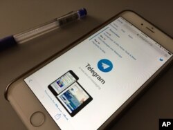 FILE - The messaging app Telegram is displayed on a smartphone, July 15, 2017.