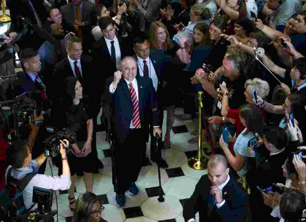 House Republican Whip Steve Scalise walks with his wife Jennifer, left, as he leaves the House chamber in the Capitol in Washington, D.C. Scalise returned to the House, more than three months after a baseball practice shooting left him fighting for his life.