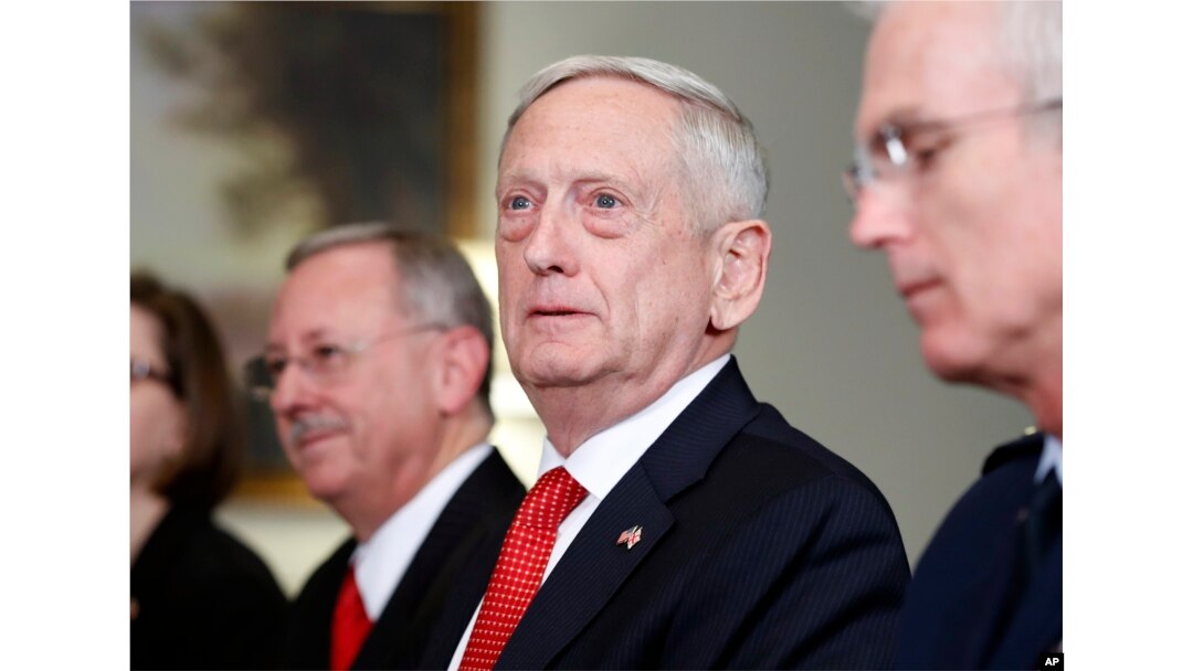 Defense Secretary Jim Mattis listens to a reporter's question during a meeting with Georgian Defense Minister Levan Izoria at the Pentagon, Nov. 13, 2017, in Washington.