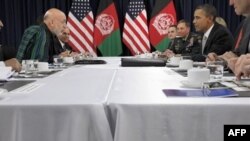 Президенты США и Афганистана на двусторонних переговорах, прошедших в рамках саммита НАТО.