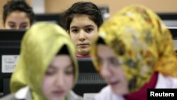 Turkish girls attend computer lessons at Kazim Karabekir Girls' Imam-Hatip School, Istanbul, February 10, 2010.
