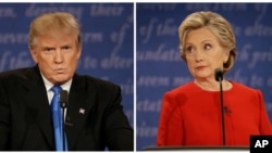 The first presidential debate between Republican nominee Donald Trump, left, and Democratic nominee Hillary Clinton, was held at Hofstra University in Hempstead, N.Y., Sept. 26, 2016.