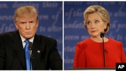 FILE - The first presidential debate between Republican nominee Donald Trump, left, and Democratic nominee Hillary Clinton, was held at Hofstra University in Hempstead, N.Y., Sept. 26, 2016.