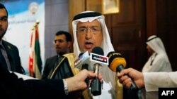 FILE - Saudi Arabia's Minister of Electricity and Water Abdullah al-Hussayen speaking to the press in Kuwait City. King Salman has sacked Hussayen amid public anger over price hikes, state media reported on April 24, 2016.