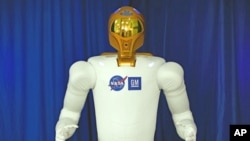 A photo of the first human-like robot - Robonaut 2, or R2 - on the International Space Station to make its operational debut on the orbiting lab.