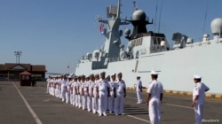 Cambodian navy officials attend a ceremony after conducting an exercise with Chinese naval officers in Preah Sihanouk province, Cambodia February 26, 2016. REUTERS/Samrang Pring