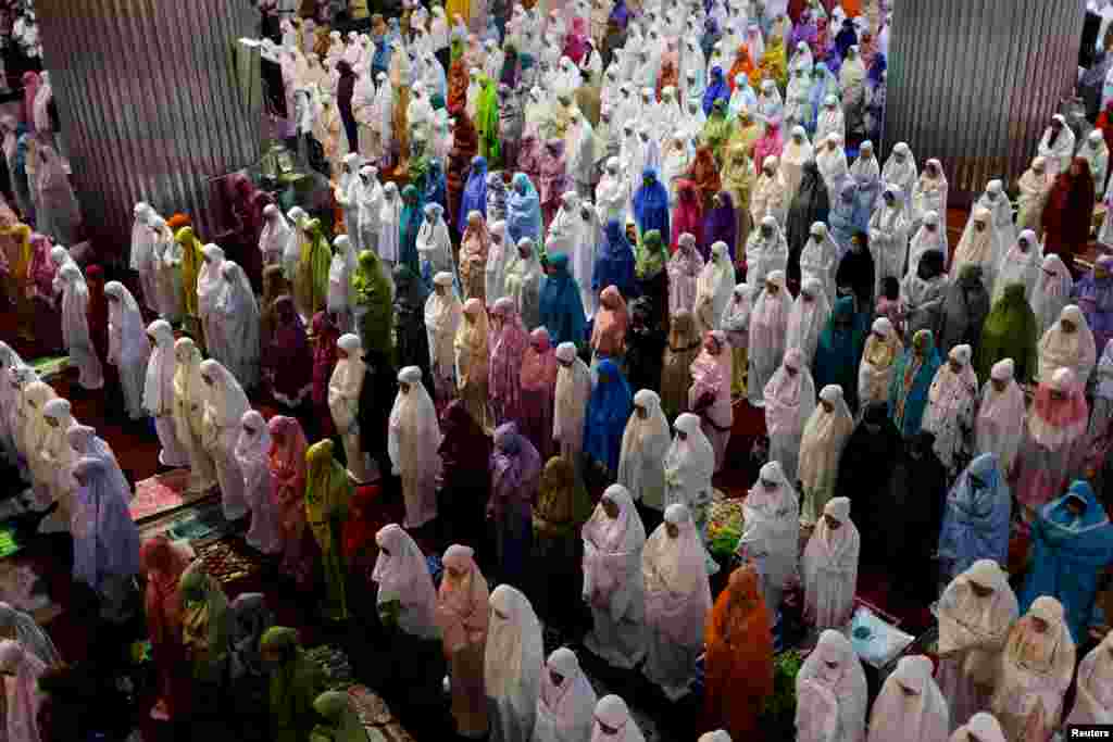 Muslim women attend Ramadan tarawih prayer at Istiqlal mosque in Jakarta, Indonesia.