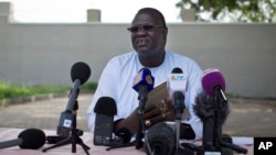 FILE - A July 26, 2013 photo shows former South Sudan VP Riek Machar speaking to the media to announce he will run for the presidency in 2015 against President Salva Kiir, who sacked Machar and his cabinet this week, Juba, South Sudan. 