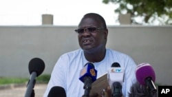 FILE - A July 26, 2013 photo shows former South Sudan VP Riek Machar speaking to the media to announce he will run for the presidency in 2015 against President Salva Kiir.