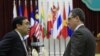 Russian Deputy Foreign Minister Igor Morgulov, left, talks with ASEAN's Deputy Secretary-General Nyan Lynn, right, before the ASEAN-Russia Ministerial Meeting in Phnom Penh, Cambodia, July 11, 2012. 