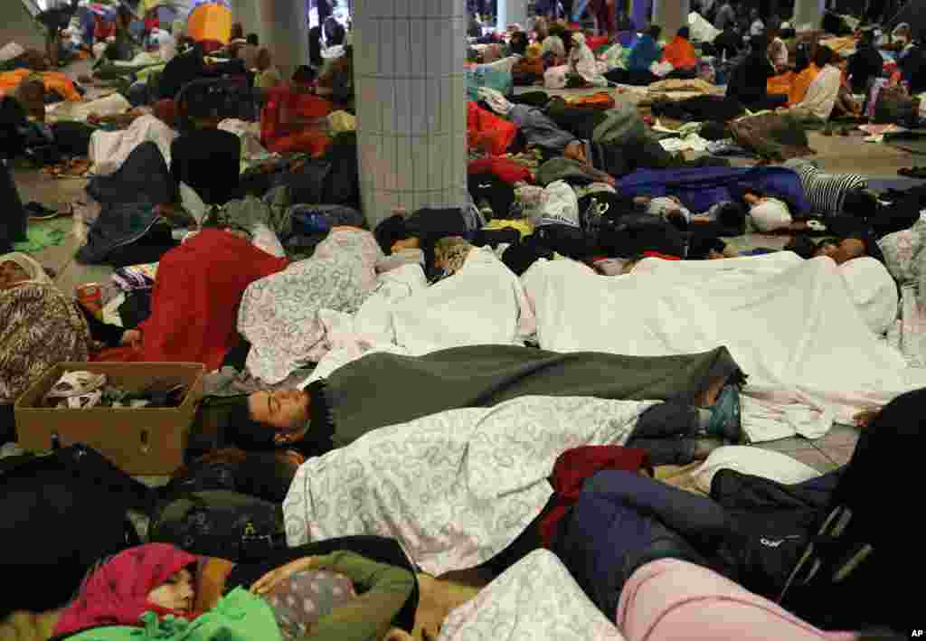 Asylum seekers sleep at Keleti underground railway station in Budapest, Hungary, Sept. 4, 2015. 