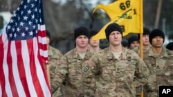 Members of the U.S. Army take part in a NATO ceremony at the Rukla base west of the capital Vilnius, Lithuania, Feb. 7, 2017. 