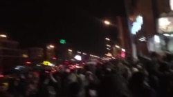 Protesters on Azadi Street sing 