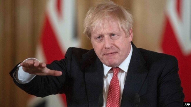 英国首相约翰逊3月20日举行记者会谈判新冠病毒疫情